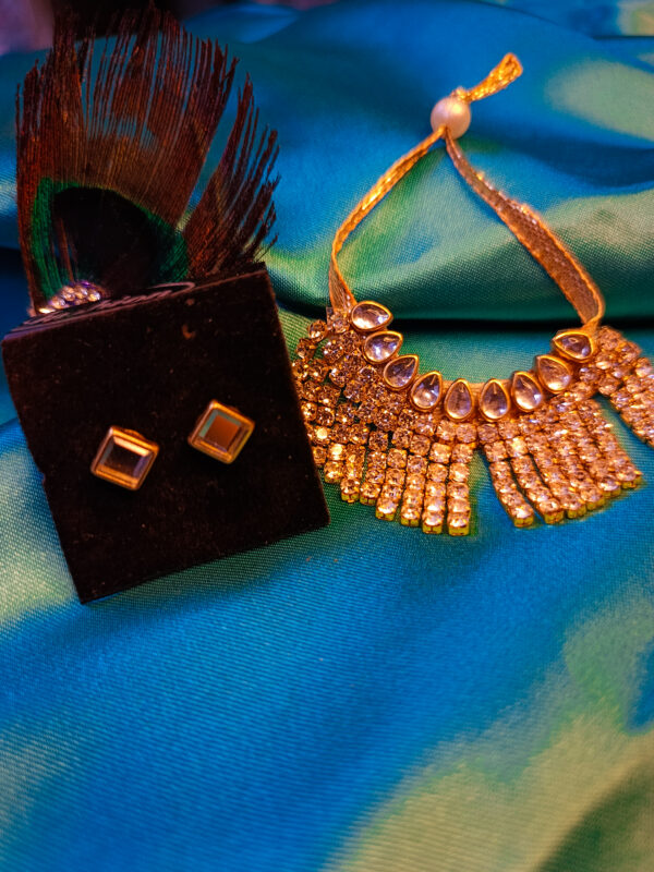 Graceful Kundan and Jarkan Necklace with Ear Studs